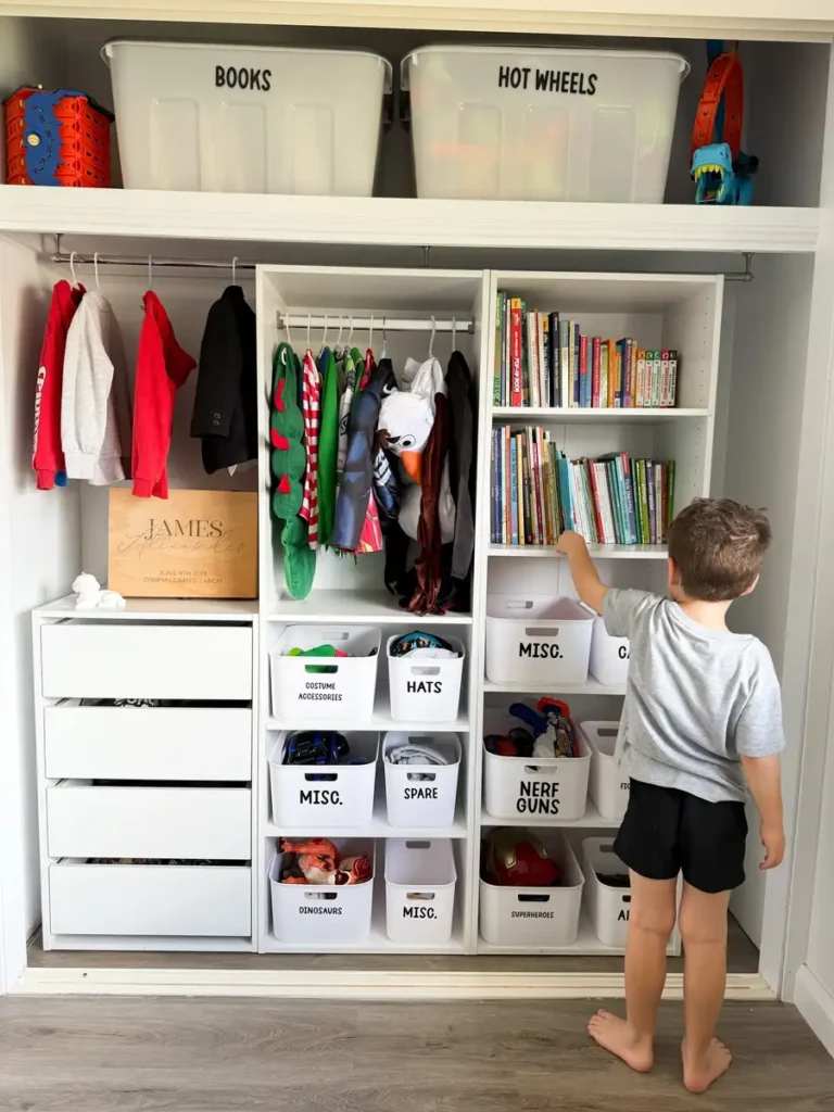 Organized entry closet with hanging clothes, bookshelves, drawers, and labeled bins for children’s gear.