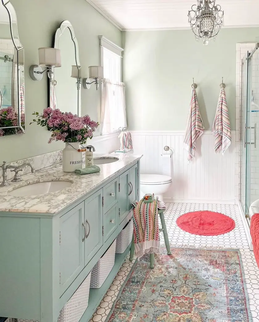 Modern olive green vanity bathroom with tropical botanical wall mural, round brass mirror and marble countertop