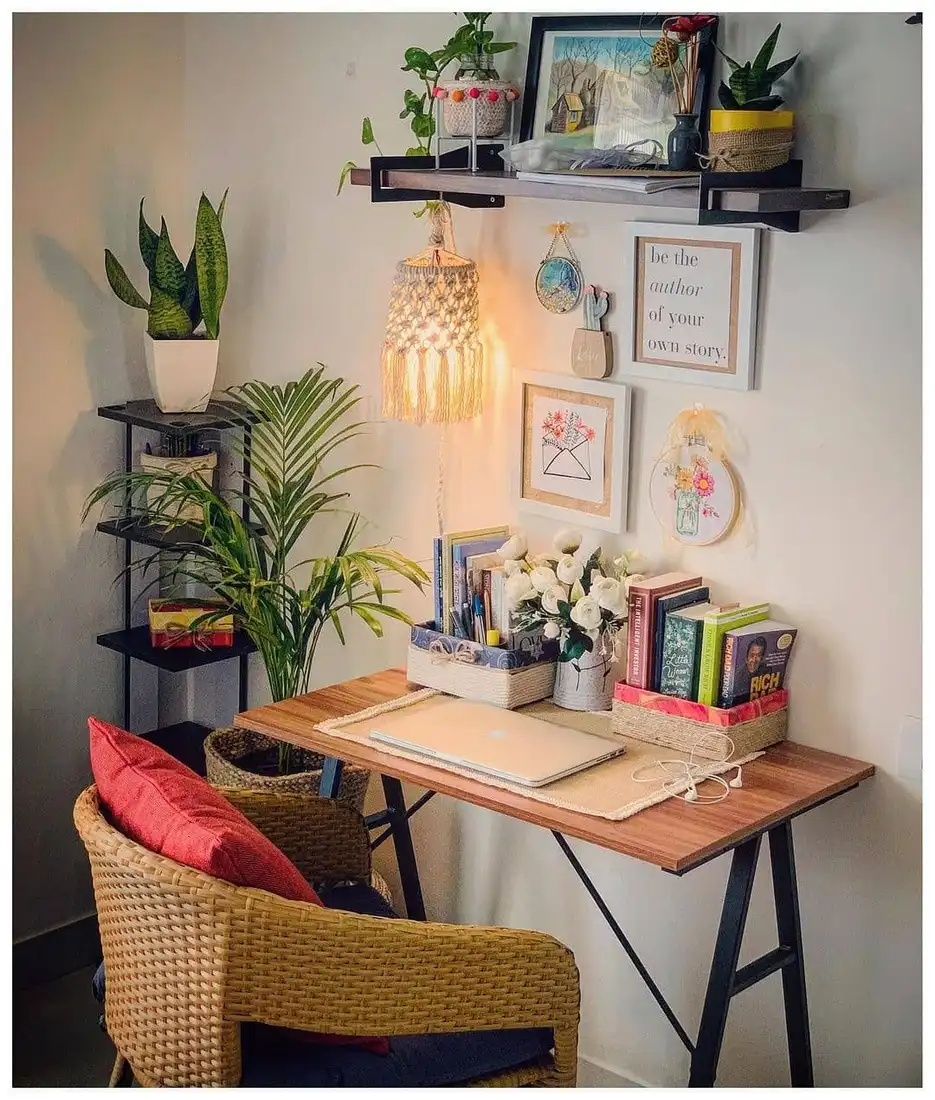 Small homework desk with floating wall shelf, baskets, plants, and narrow side storage unit