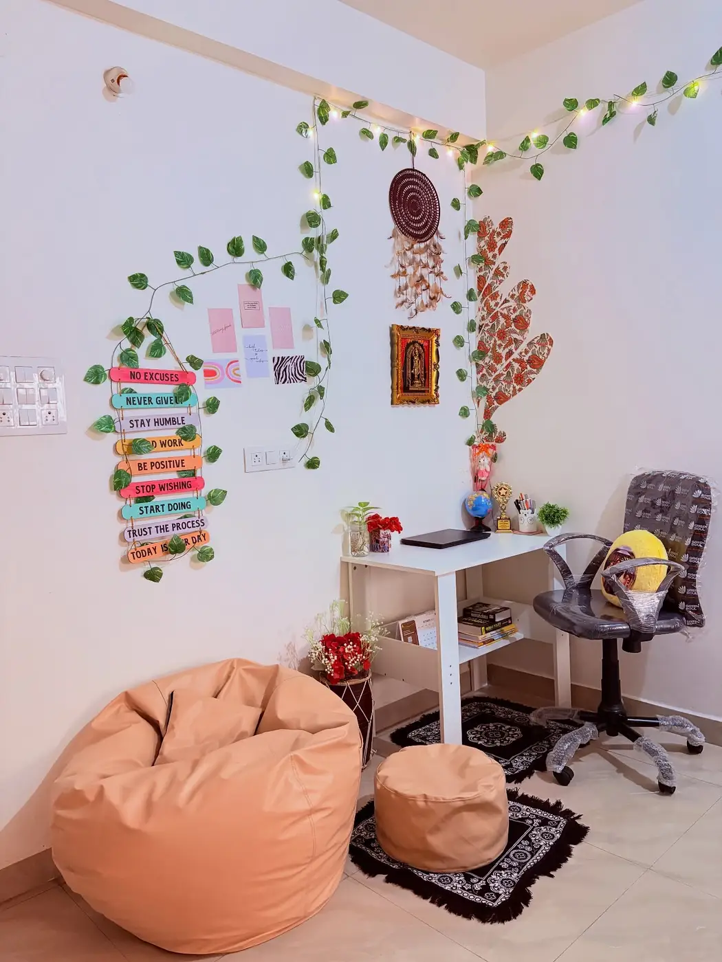 Small homework station with desk, beanbag reading chair, ottoman, lamp, and under-desk shelves