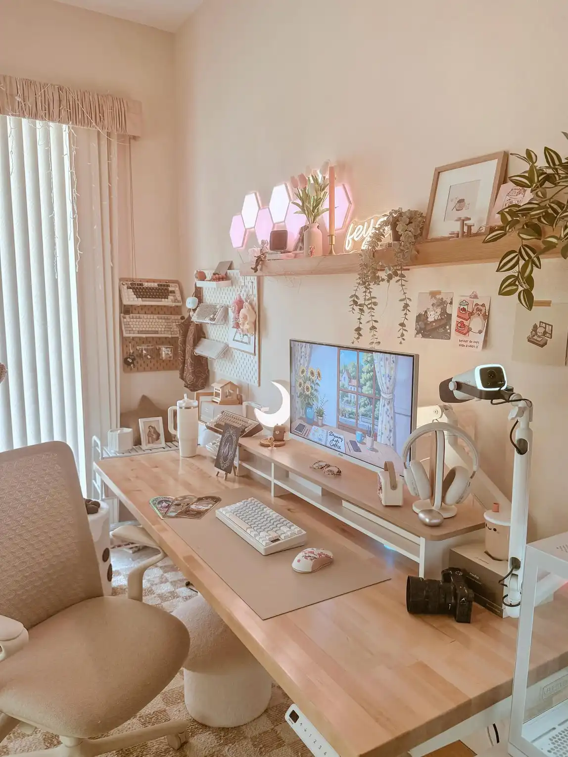 Long light wood dorm desk with monitor, lamp, organizers, and open study space